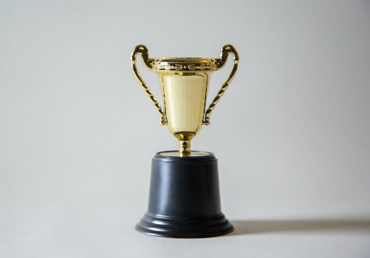 Golden trophy with a black base